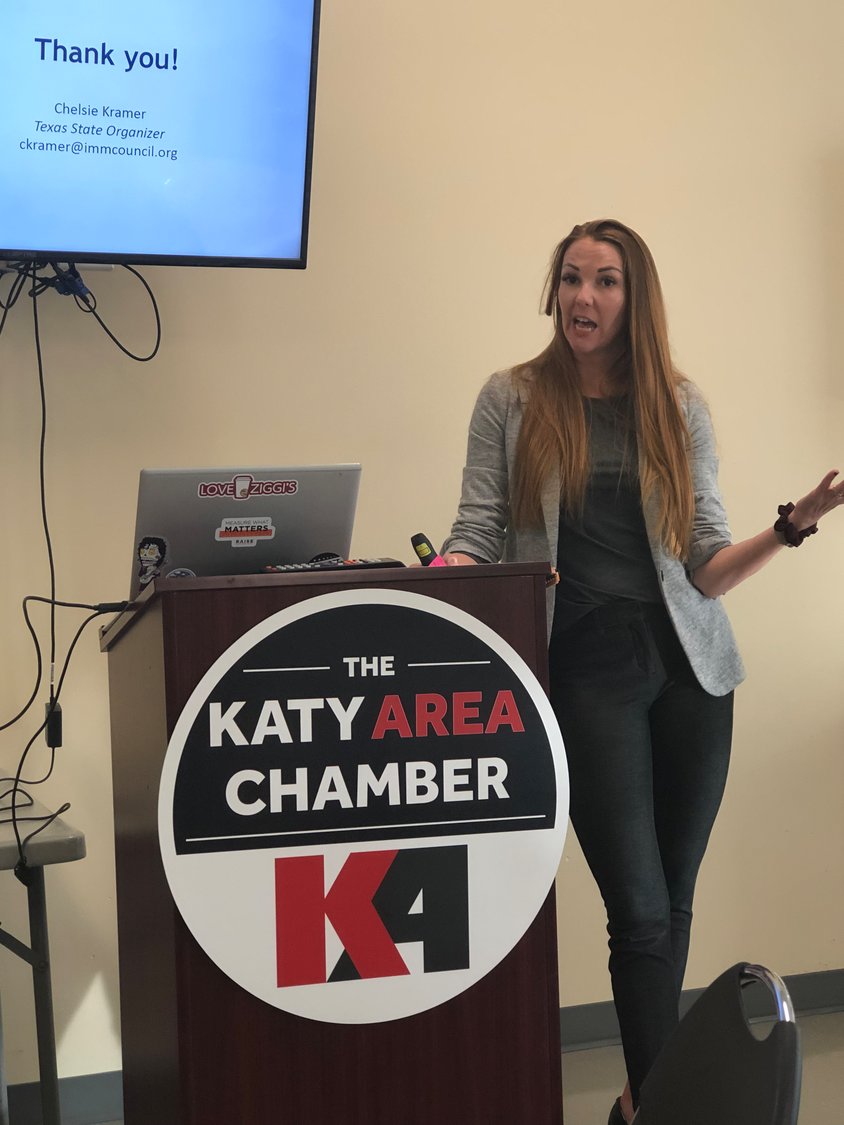 Chelsie Kramer of the American Immigration Council speaks at the Katy Area Chamber of Commerce.